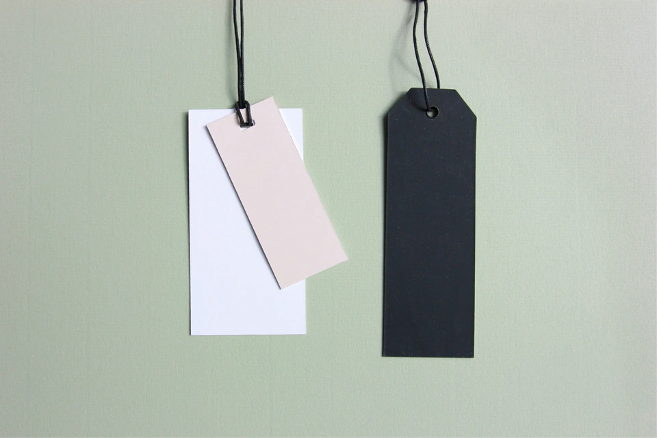 three assorted-color tags — stock style reference