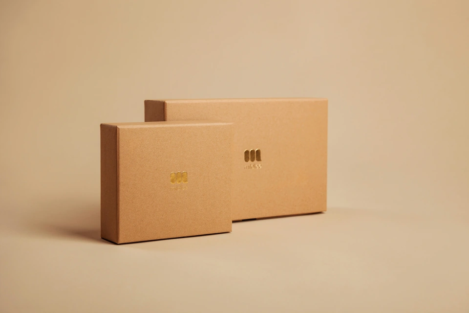 brown cardboard box on white table — stock style reference
