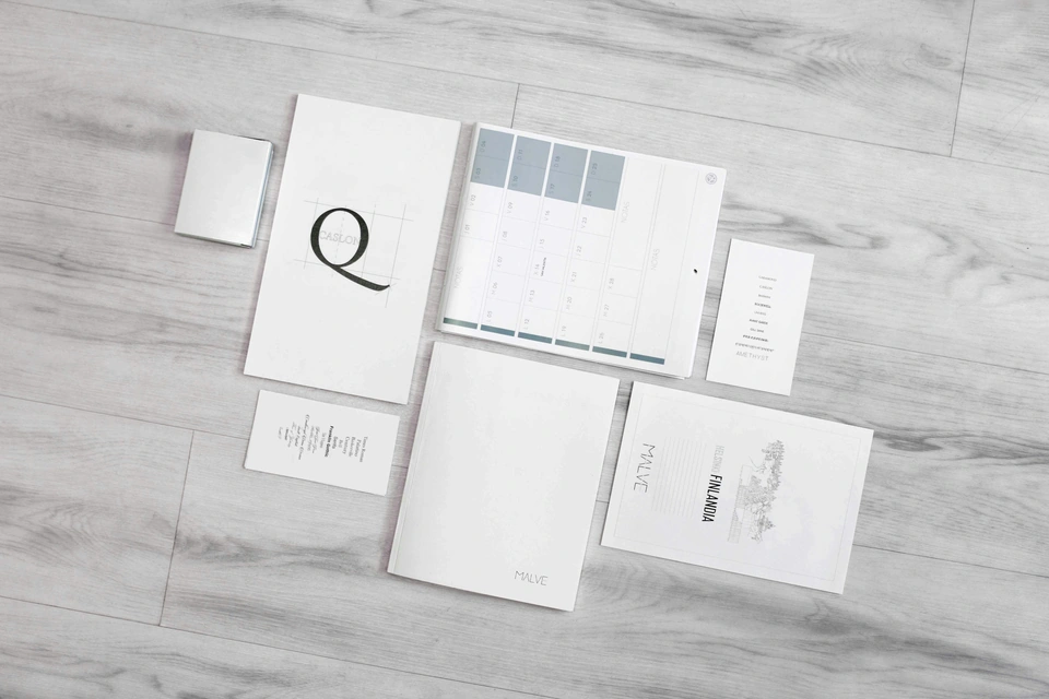 flat-lay photography of white printer papers — stock style reference